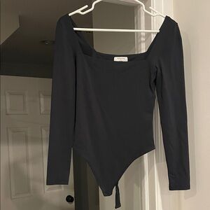 Brand new Aritzia Babaton Black Long Sleeve Bodysuit size medium